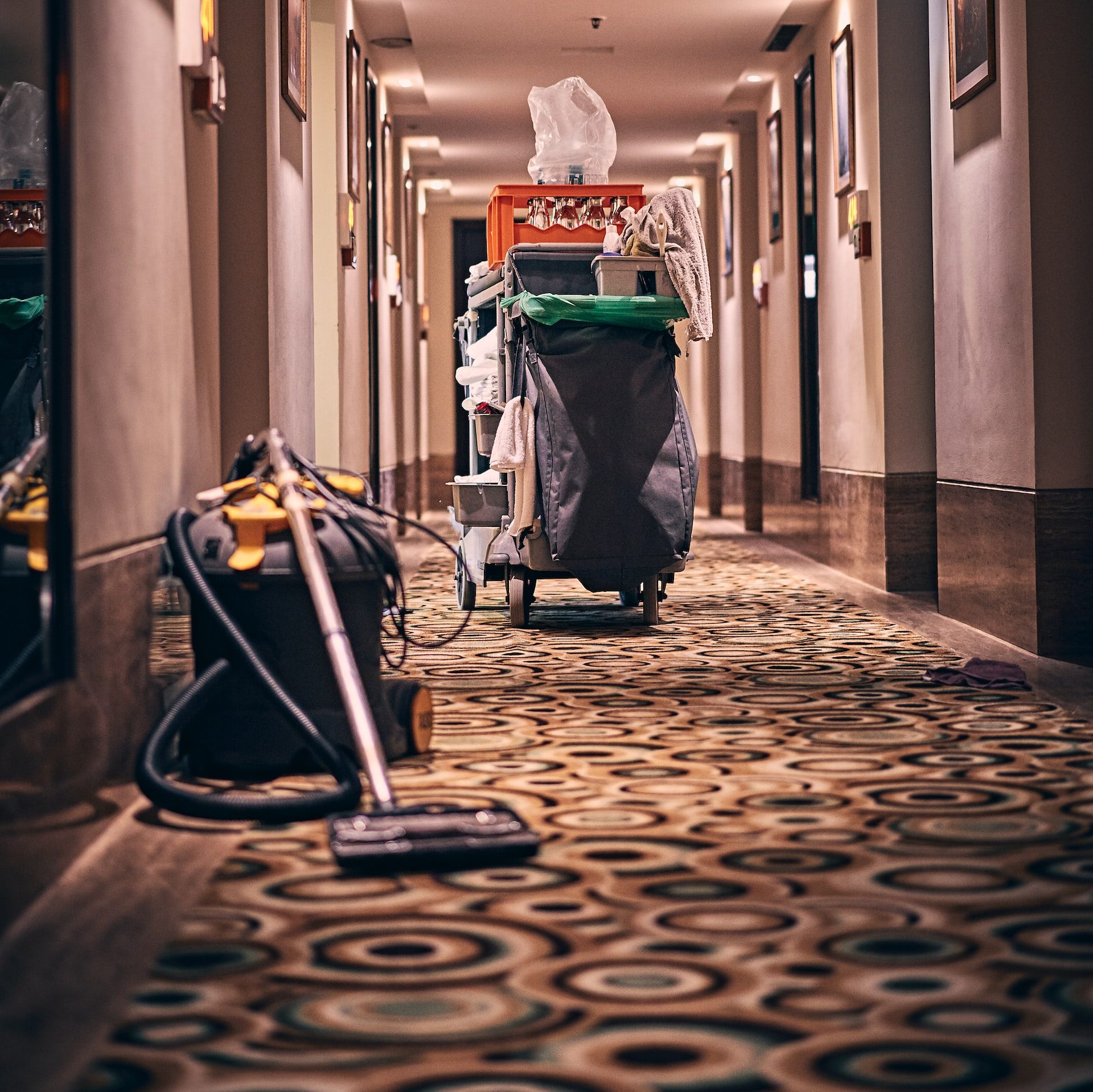 black and gray stroller on hallway